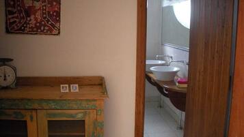 Bathtub, hair dryer, towels, soap