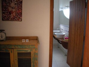 Bathtub, hair dryer, towels, soap