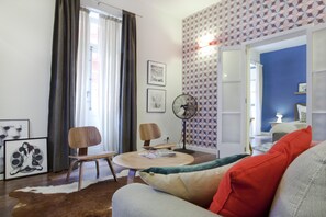 Apartment | Living area | 70-inch Smart TV with digital channels, streaming services - Premium Design Central Suite (Valletta)