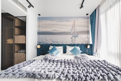 Suite clàssica | Minibar, caixa forta a l'habitació i cortines opaques