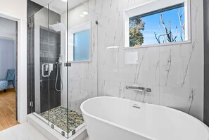 Combined shower/tub, hair dryer, towels, shampoo