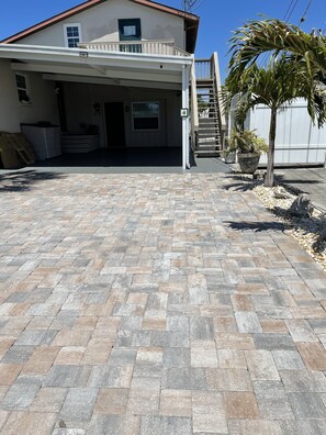 Enjoy a garage with a balcony and outdoor space.