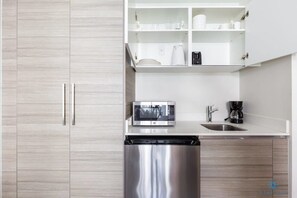 Fridge, microwave, coffee/tea maker, toaster