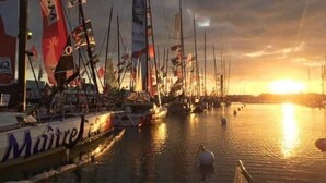 A marina at sunset with multiple sailboats docked. - SEASONAL HOUSE RENTAL (Les Sables-d'Olonne)