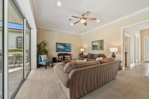 TV, fireplace - Homestead Laurel: Private Pool, Water Park, Golf View, Near Disney (Kissimmee)