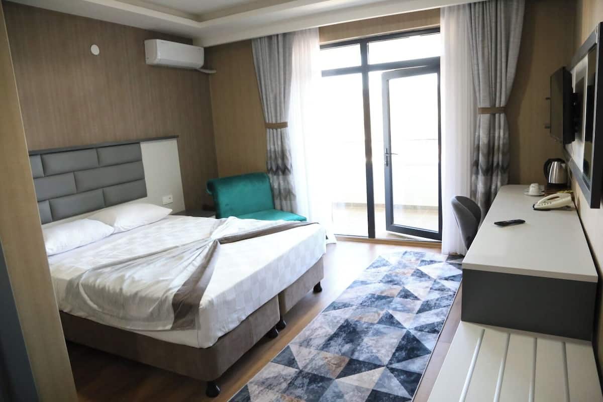 Standaard kamer | 1 slaapkamer, een minibar, een kluis op de kamer, een laptopwerkplek