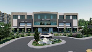 A modern building with "LOKANTA" and "TOKAT TERNAL" signage, a cafe, and a fountain in the center. - Tokat Termal Kaplıcaları (Sulusaray)