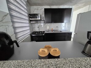 Fridge, microwave, oven, stovetop