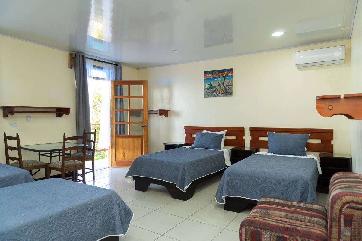 Family Room | Egyptian cotton sheets, premium bedding, desk, laptop workspace