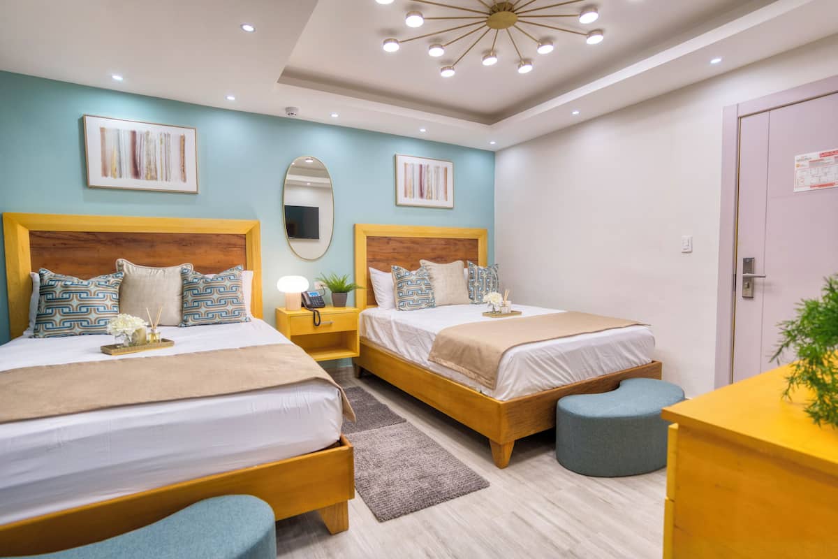 Premium Quadruple Room | Memory foam beds, WiFi (free), bed sheets