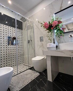 Deluxe Condo | Bathroom | Hair dryer, bathrobes, slippers, bidet - GianLuis Luxury Suites (Fasano)