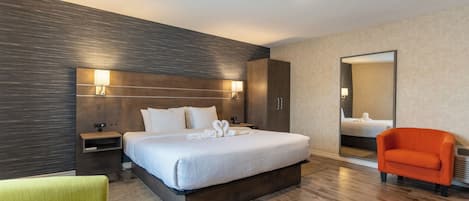 Deluxe Single Room | Premium bedding, desk, laptop workspace, blackout curtains