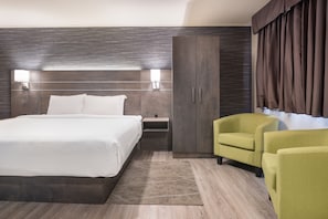 Deluxe Single Room | Premium bedding, desk, laptop workspace, blackout drapes