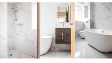 Combined shower/bathtub, hair dryer, towels, soap