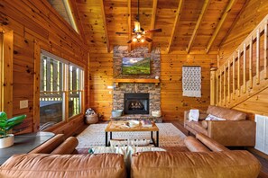 Smart TV, fireplace, books, stereo