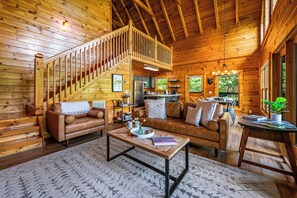 Smart TV, fireplace, books, stereo