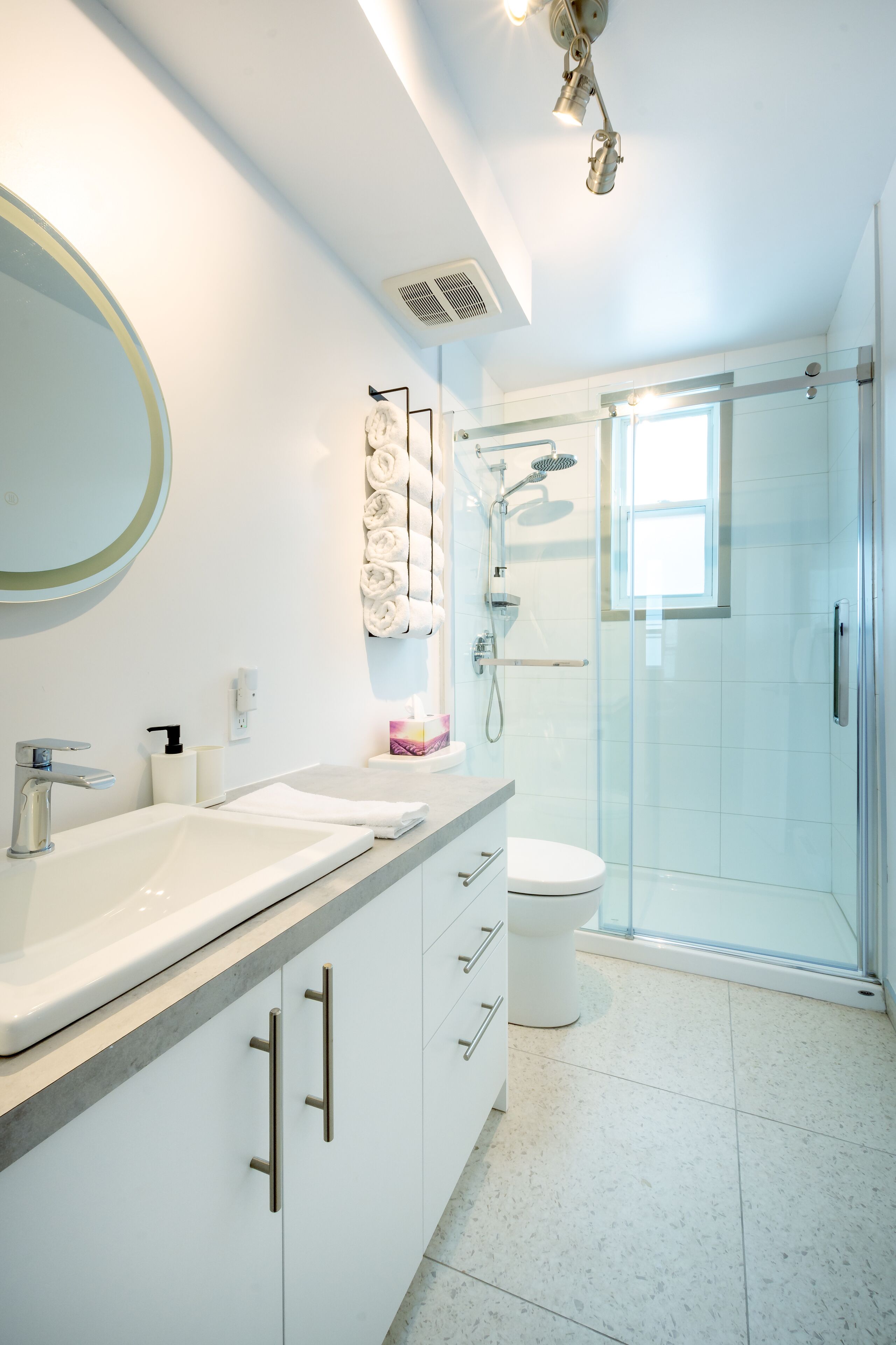 Shower, hair dryer, towels, soap
