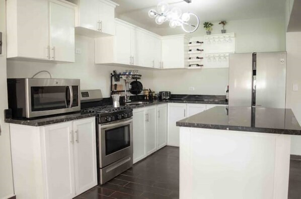 Fridge, microwave, oven, stovetop