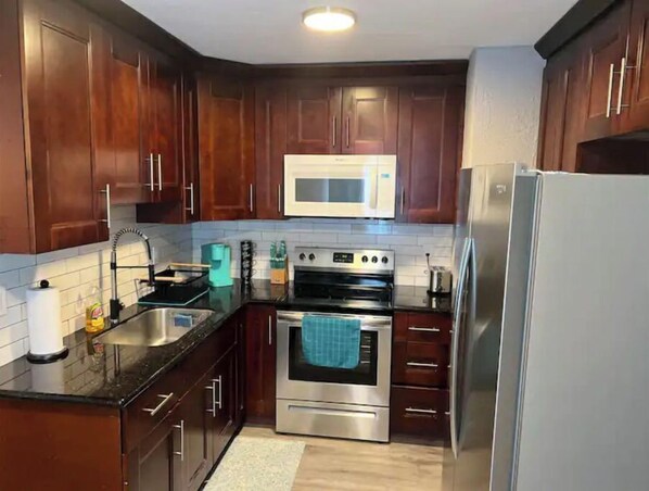 Coffee/tea maker, toaster, blender, cookware/dishes/utensils