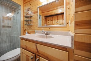 Bathtub, towels, toilet paper