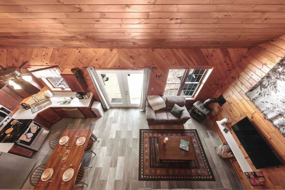 Overlook the main living areas (living room, kitchen/dining) from the loft