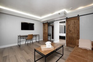 Deluxe Suite | Premium bedding, desk, laptop workspace, blackout drapes