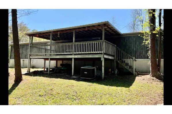 Stroll up to this charming two-story residence with a covered deck area.