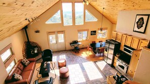 Smart TV, fireplace, table football, books