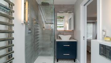 Bathtub, hair dryer, towels