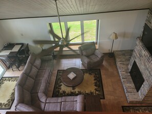 Smart TV, fireplace, books, printers