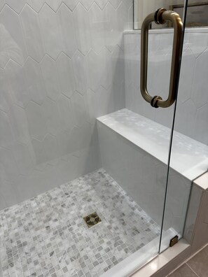 Combined shower/tub, hair dryer, towels, soap
