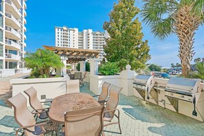 Outdoor dining - Garden-view condo with lagoon & kid's pools, beach access, on-site eateries & AC (Destin)