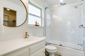 Combined shower/bathtub, hair dryer, towels, soap - Cowtown Oasis w/ Gated Pool, Huge Backyard, BBQ! (Fort Worth)