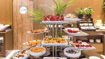 Daily buffet breakfast (USD 18 per person)