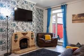 Ferienhaus | Wohnzimmer | Kamin