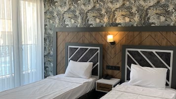 Deluxe Twin Room, 2 Twin Beds | Minibar, in-room safe, desk, laptop workspace