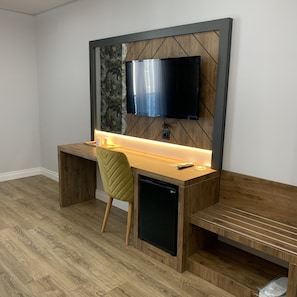 Luxury Triple Room | Minibar, in-room safe, desk, laptop workspace