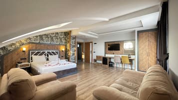 Suite estudio Deluxe | Área de sala de estar