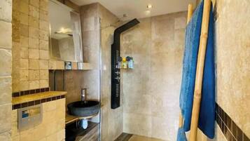 Shower, hair dryer, towels, soap