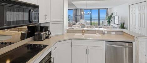 Coffee/tea maker, fridge, microwave, oven