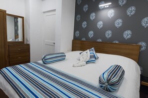 2 habitaciones, tabla de planchar con plancha y wifi gratis 