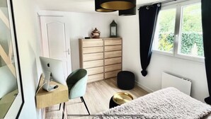 A bedroom with a desk, chair, wardrobe, and a window with curtains. - House with spa surrounded by nature in Saint Paul de Vence (Saint-Paul-de-Vence)