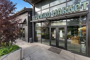 A storefront with a large sign reading 'BLUEBIRD MARKET'. - Pet-Friendly with Private Fenced-In Backyard and Beautiful Mountain Views! (Silverthorne)