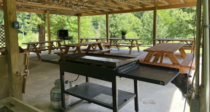 Beautiful 4 unit lodge w/ Hot tub, WiFi, fire pits & pavilion area with grills