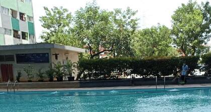 THE ROOMOS Hotel Apartemen