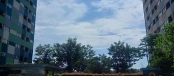 THE ROOMOS Hotel Apartemen