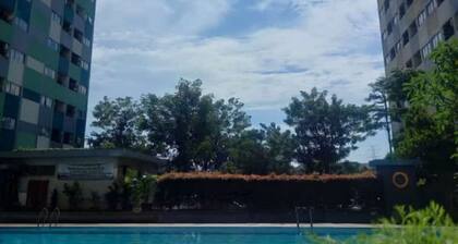 THE ROOMOS Hotel Apartemen