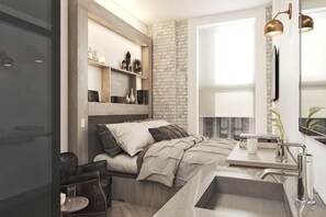 A modern bedroom with a bed, bedside tables, a mirror, and a window. - Walker Hotel Tribeca (New York)