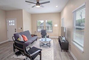 House (3 Bedrooms) | Living area | 50-inch TV with digital channels
