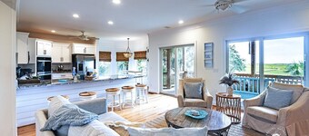 Low Country Home w/ Creek & Ocean views, dock, & indoor / outdoor living spaces